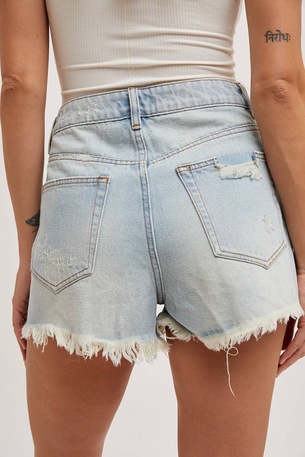 HIGH RISE DISTRESSED DENIM SHORTS