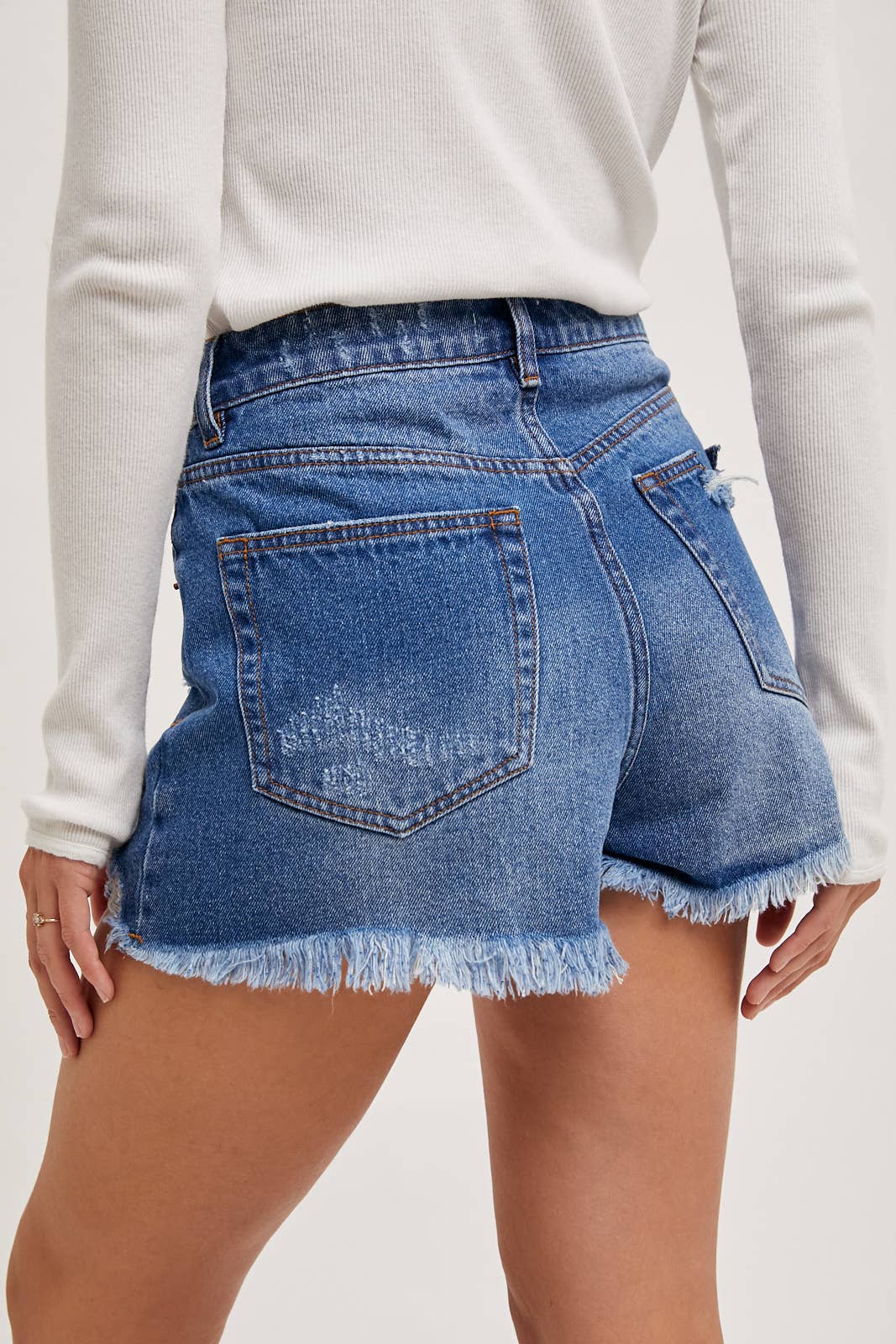 HIGH RISE DISTRESSED DENIM SHORTS