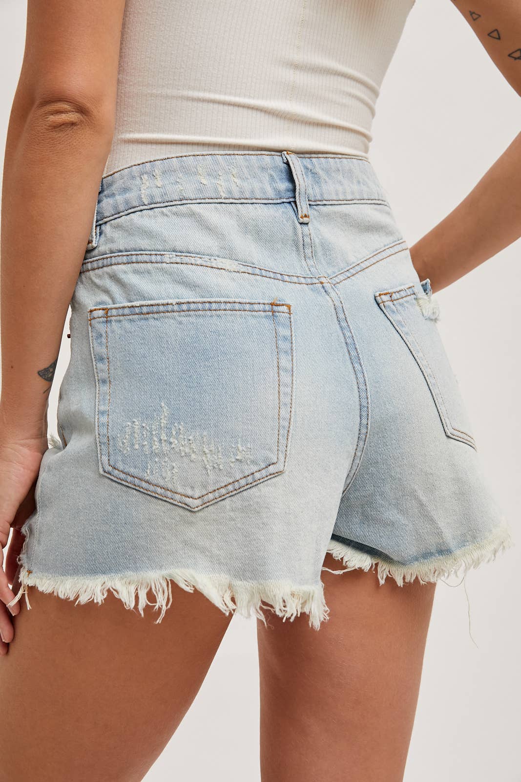 HIGH RISE DISTRESSED DENIM SHORTS